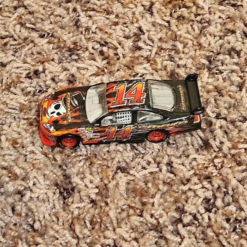 1/64 diecast race car, orange and black with #14 and skull graphics