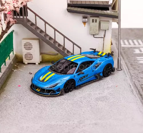Blue racing sports car diecast model with yellow stripes and black wheels