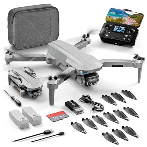 Grey quadcopter drone kit with controller, battery, and spare propellers