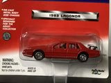 1983 Lagonda 1:64 diecast toy car, red, in clear blister packaging