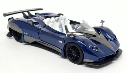 Blue open-top diecast sports car model with black wheels and rear spoiler