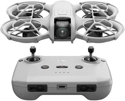 Gray mini quadcopter drone with front camera and four propellers, with gray remote controller