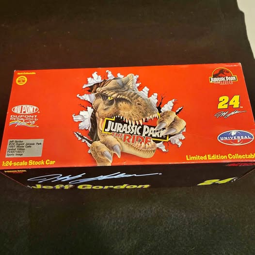 Jurassic Park NASCAR diecast box with dinosaur and #24 graphics