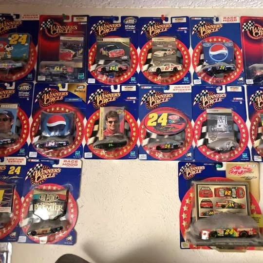 Jeff Gordon diecast car collection set with multiple boxed cars on display