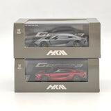 Diecast supercar model set, two boxed cases with clear windows and HKM logo