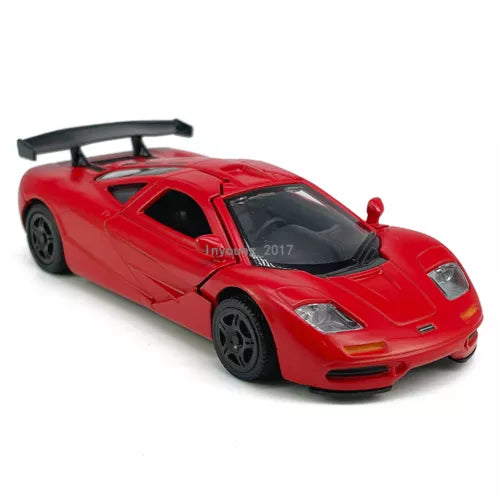 Red diecast model sports car with open hood detail, front three-quarter view