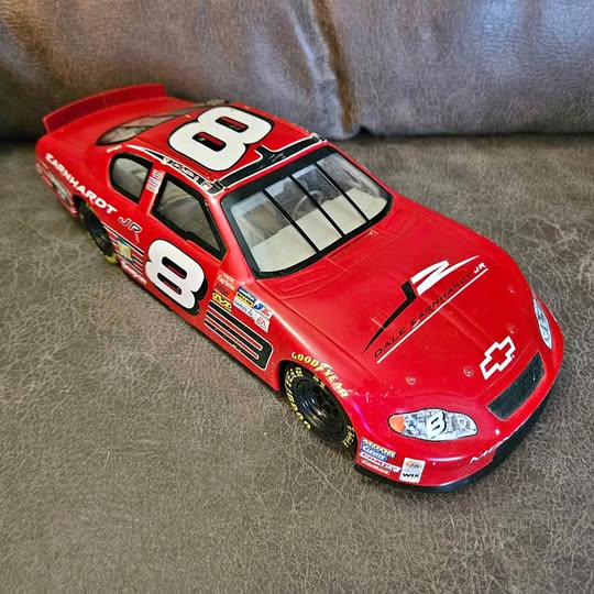 Red die-cast NASCAR race car with number 8 decals and sponsor logos