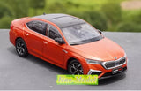 Orange 1:18 alloy diecast car model, front three-quarter view, detailed grille and headlights