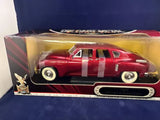 1/18 scale burgundy diecast classic car with white racing stripes and front grille