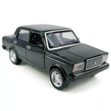 Dark gray 1:32 diecast model car with chrome grille, front lights, and side doors