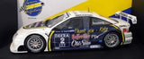 White and yellow race car diecast model with sponsor decals and front grille