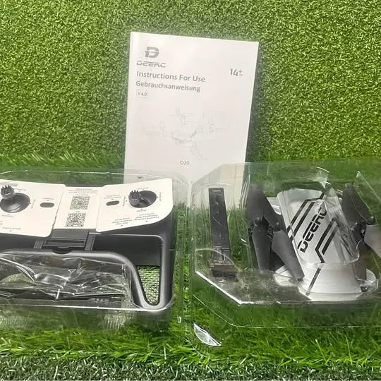 Mini drone kit with controller, instruction manual, and propeller parts