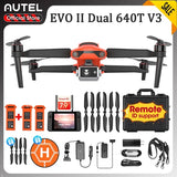 Orange and black drone kit with camera gimbal, remote controller, and carrying case