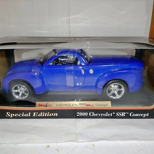 Blue Chevrolet SSR Concept diecast truck model in clear display box, chrome wheels