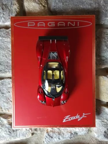 Pagani Zonda F diecast wall art, red framed display with miniature sports car