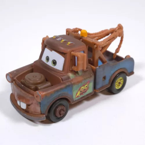 Diecast tow truck toy with brown cab, large eyes, and front tow hook