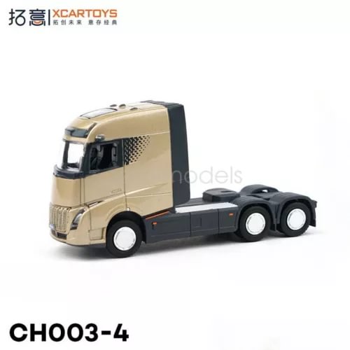 Diecast truck tractor model, gold cab with black chassis and wheels