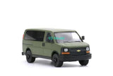Diecast metal van toy in green, front 3/4 view with black grille