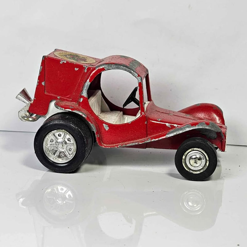 Red pie wagon diecast toy truck with open cab and white steering wheel