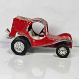Red pie wagon diecast toy truck with open cab and white steering wheel