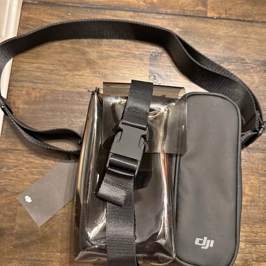 DJI mini drone bag with gray hard case and front straps, small zip pocket