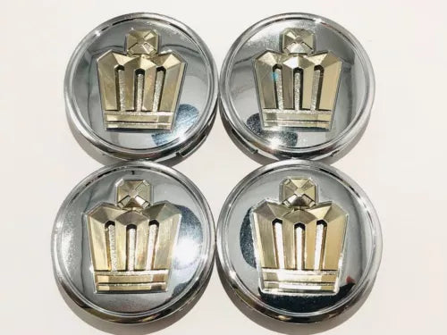 Diecast toy car wheel hubcaps with gold crown emblem, four-pack