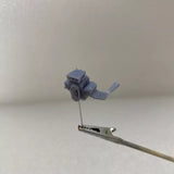 Diecast engine blower toy on metal support rod