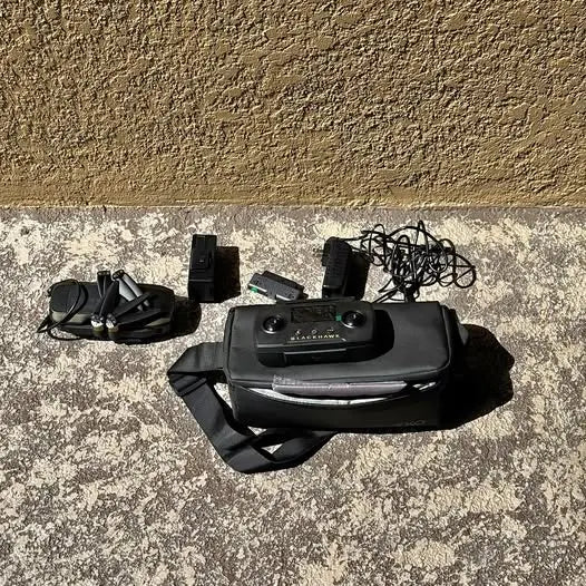 EXO Blackhawk drone with black controller and cables