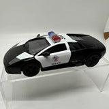 Diecast police toy car, black with white stripe and Police decals