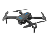 Foldable quadcopter drone with camera, black body and four propellers with blue lights