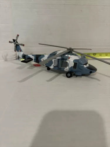 Blue and gray diecast helicopter toy with tail rotor and extended landing gear
