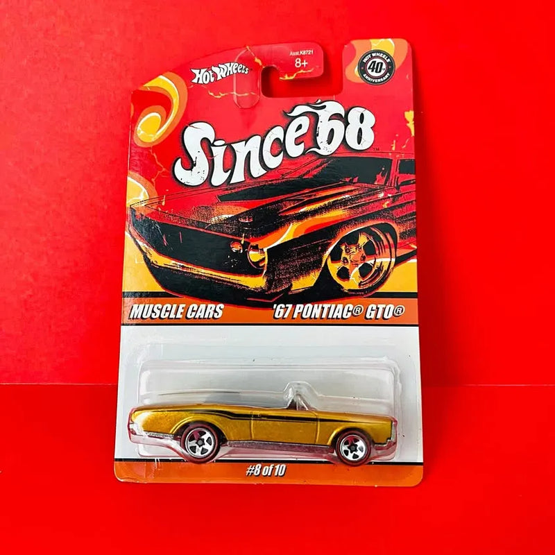 Carded diecast 1967 Pontiac GTO convertible in gold with #8 of 10 label
