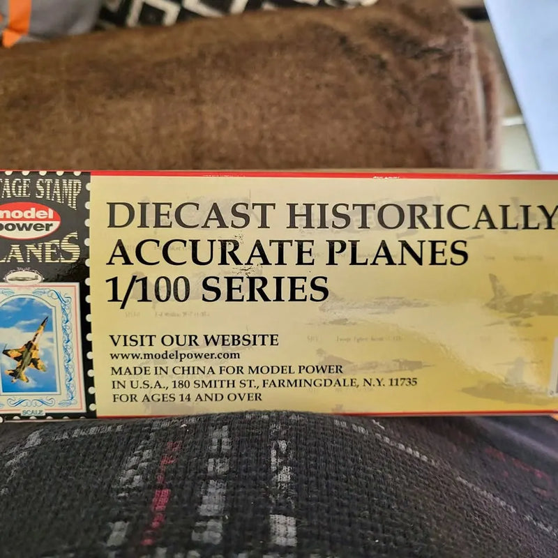 Diecast airplane model box label: historically accurate planes, 1/100 series