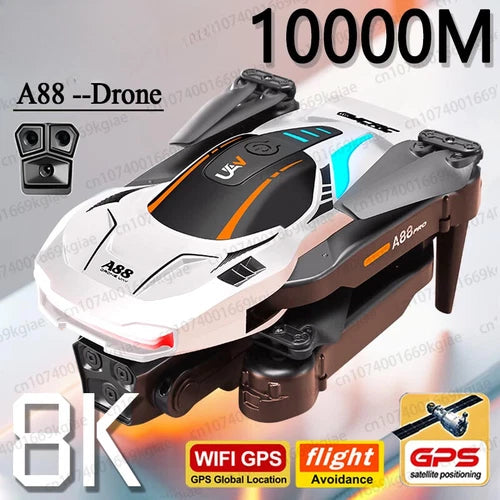 White and gray quadcopter drone with dual cameras, orange accent strips, folding arms