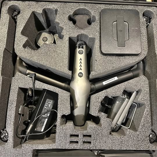 DJI Inspire 2 drone kit with X5S camera in molded foam case, drone centered.