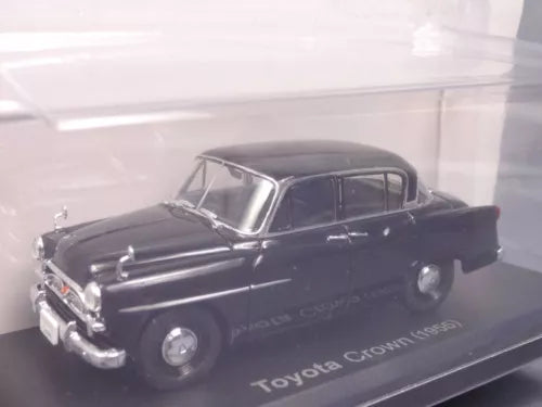 Black metal diecast sedan model car, front three-quarter view with chrome grille
