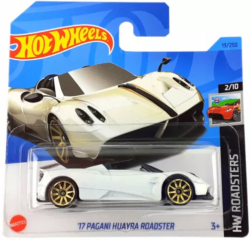 Diecast model car, white Pagani Huayra Roadster with black accents and gold wheels