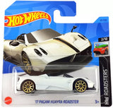 Diecast model car, white Pagani Huayra Roadster with black accents and gold wheels