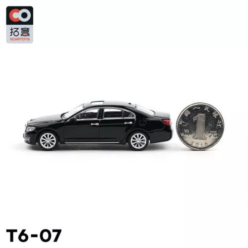 1/64 scale black diecast sedan car model with wheels and side profile
