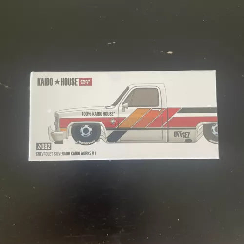 White Chevrolet Silverado diecast truck Kaido House V1 in retail box