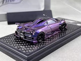 1/64 scale purple and silver diecast sports car model on display base