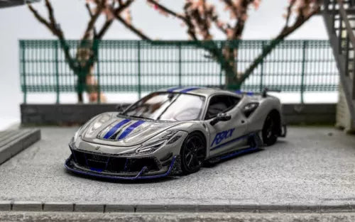 Gray and blue race car diecast model with front splitter and racing decals