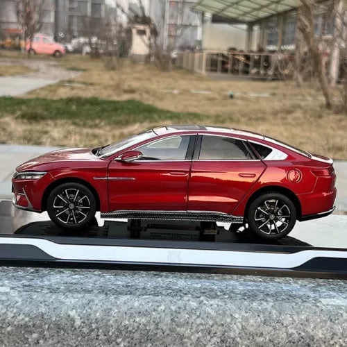 BYD HAN EV red diecast car model toy, side view with black alloy wheels