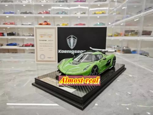 Green Koenigsegg Jesko resin diecast model car on black display base