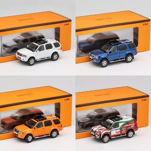 Four 1:64 diecast model cars in orange display boxes
