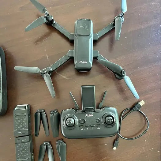 Ruko green folding drone with remote controller and phone mount, four propeller arms