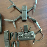 Ruko green folding drone with remote controller and phone mount, four propeller arms
