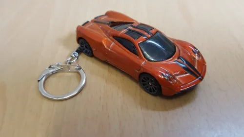 Bronze orange diecast toy car keyring with silver metal loop