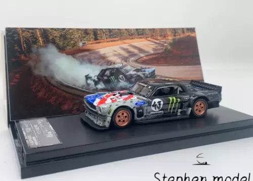 Diecast race car model, black with green and white graphics, front 3/4 view