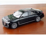 1/18 scale black diecast sedan model, front view, no base